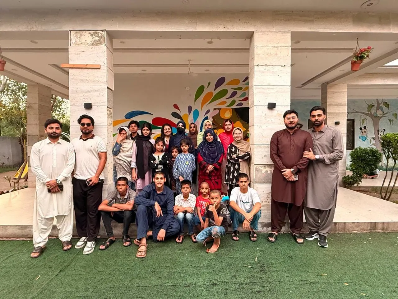 Zaviah team and children at Tahafuz Manzil Foster Home celebrating one year of impact, photo 22 of 22